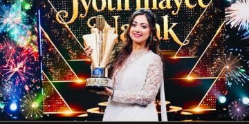 Jyotirmayee Nayak holding the Indian Idol 16 winner trophy